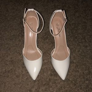 White brand new heeled shoes